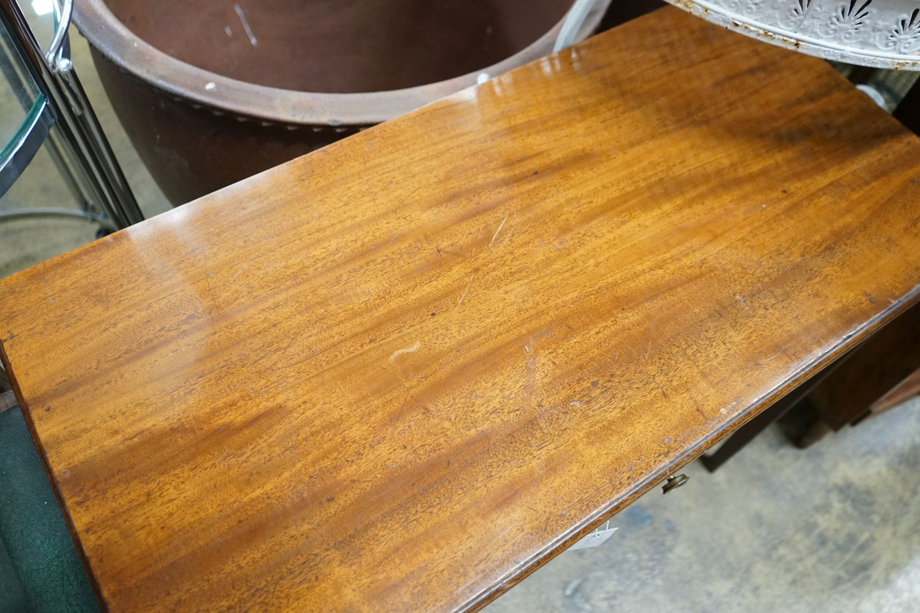 A George III rectangular mahogany folding tea table, width 91cm, depth 44cm, height 76cm